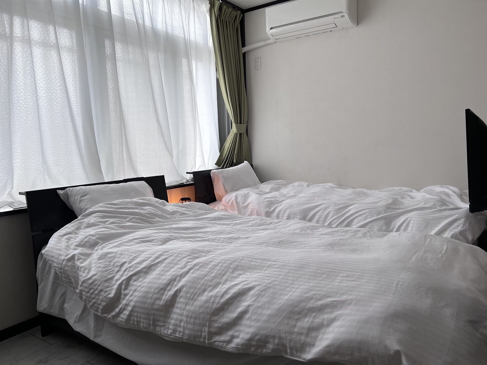 Room 301 in bright daylight